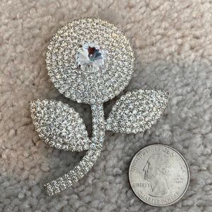 Rhinestone flower brooch silver tone